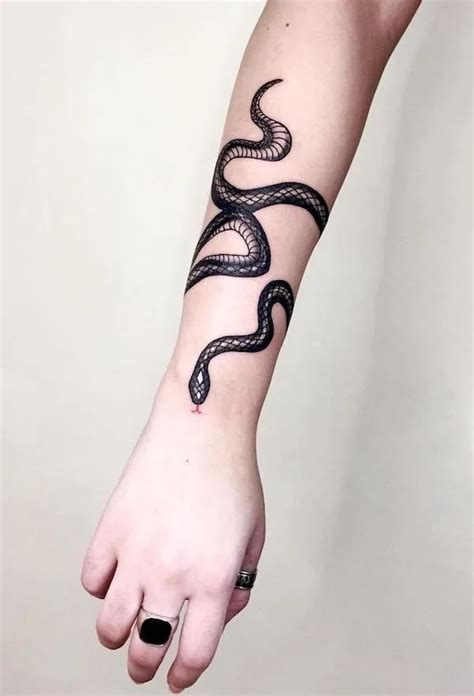 wrap around snake tattoo arm|Snake Arm Tattoo Ideas for a Fierce Look